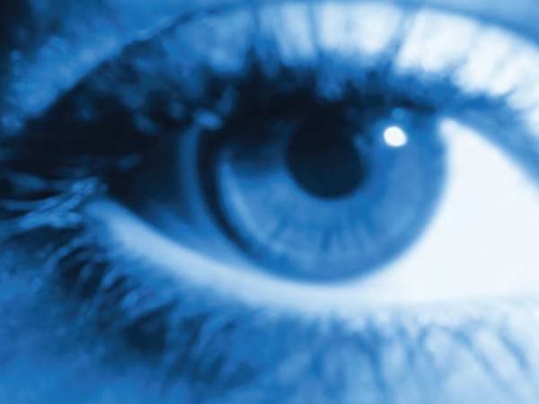 An investigation into whether blue light exposure contributes to the onset of macular degeneration, to justify supplying a blue-blocking lens for retinal protection